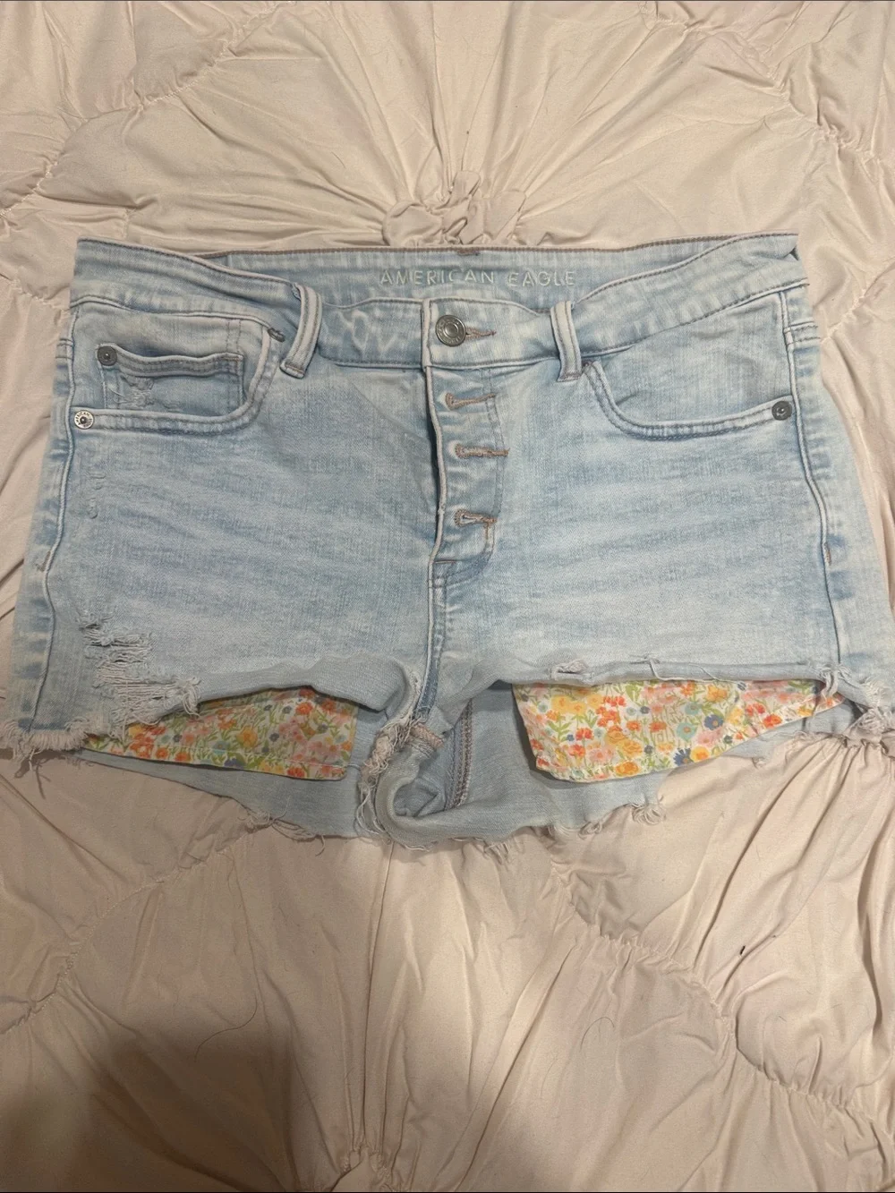 American Eagle Outfitters Light Wash Button-Fly Denim Shorts with Floral Liner